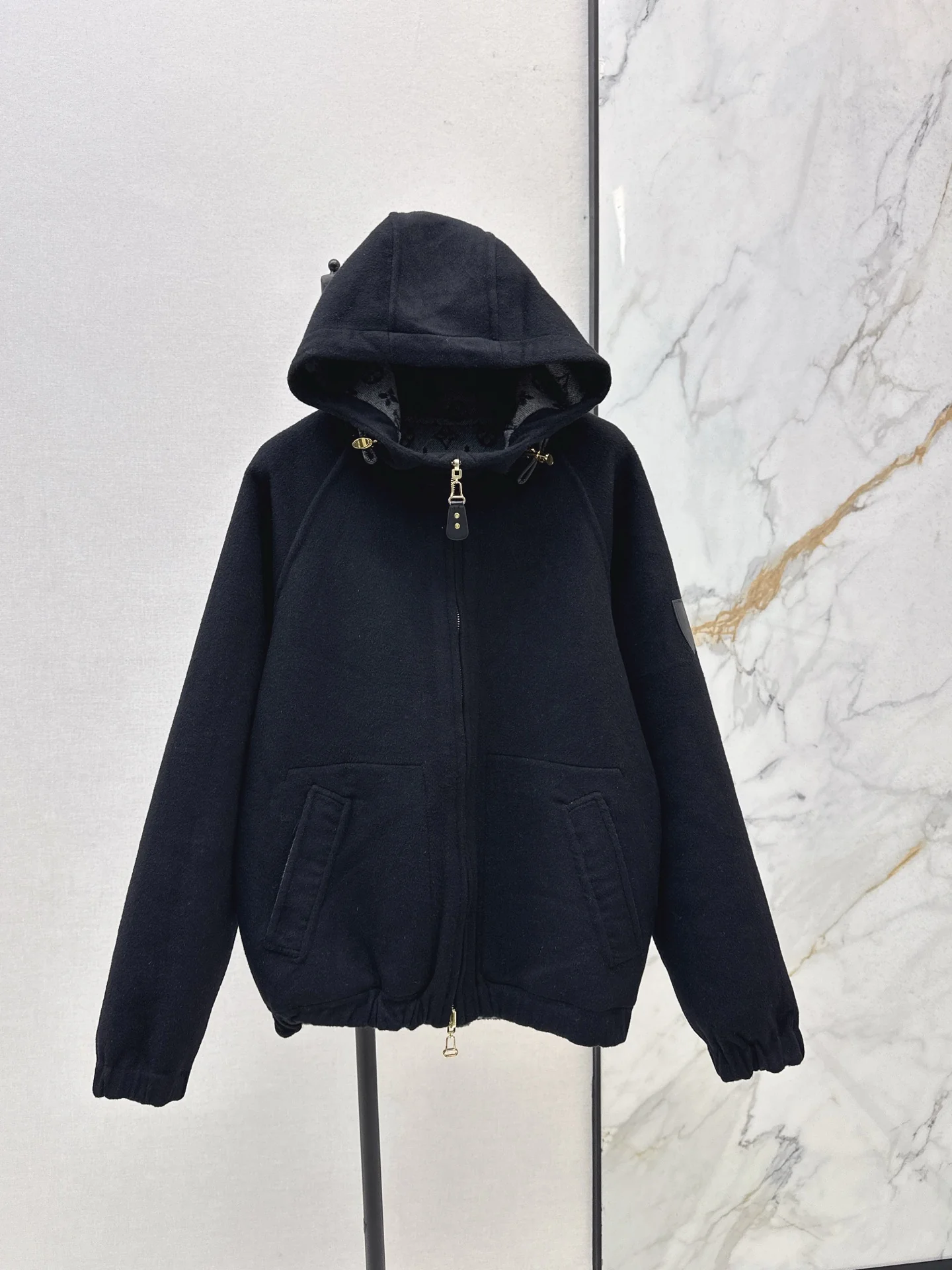 Loui 25fw reversible hooded jacket