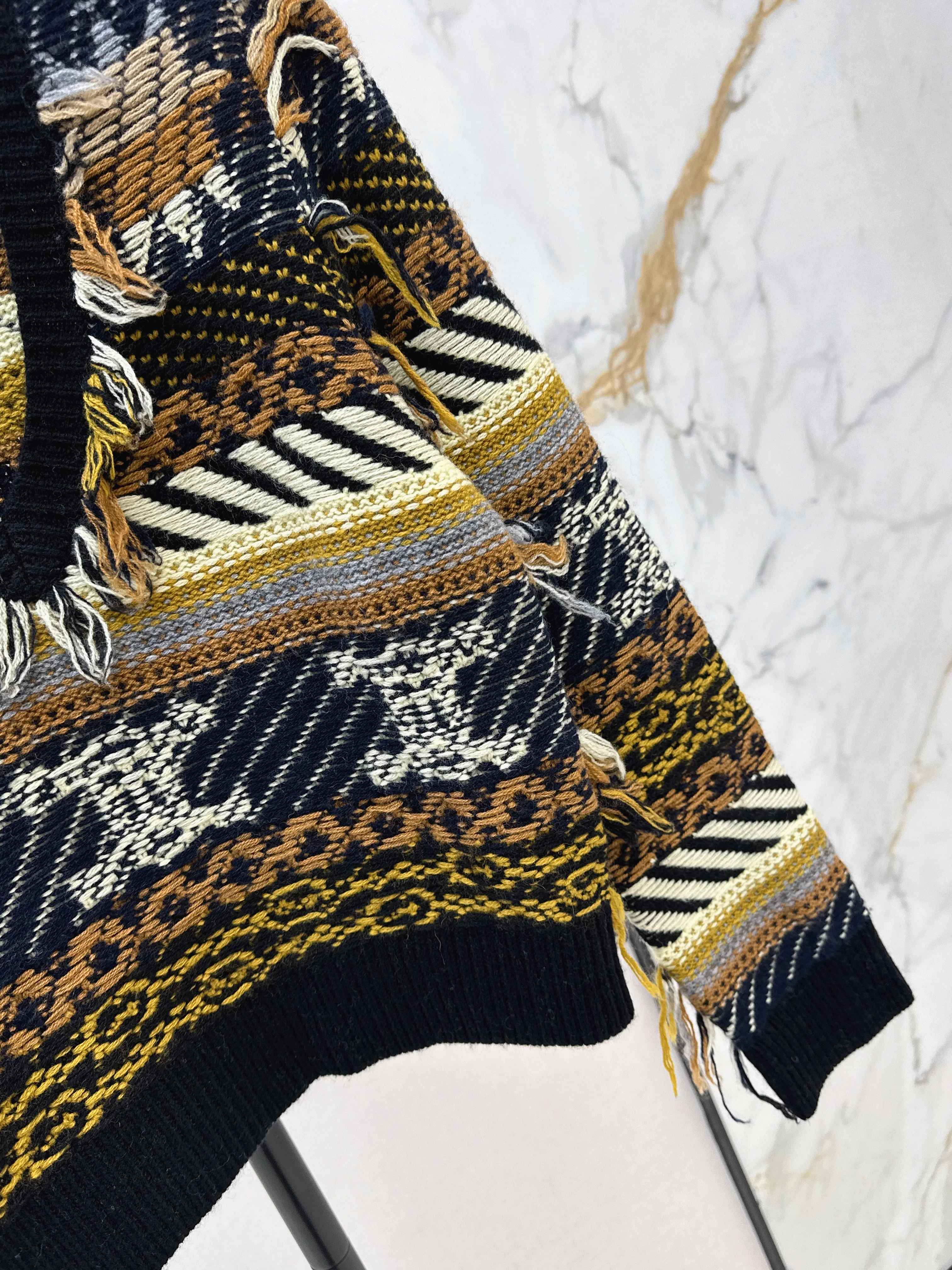 Celi 26ss tassel knit sweater