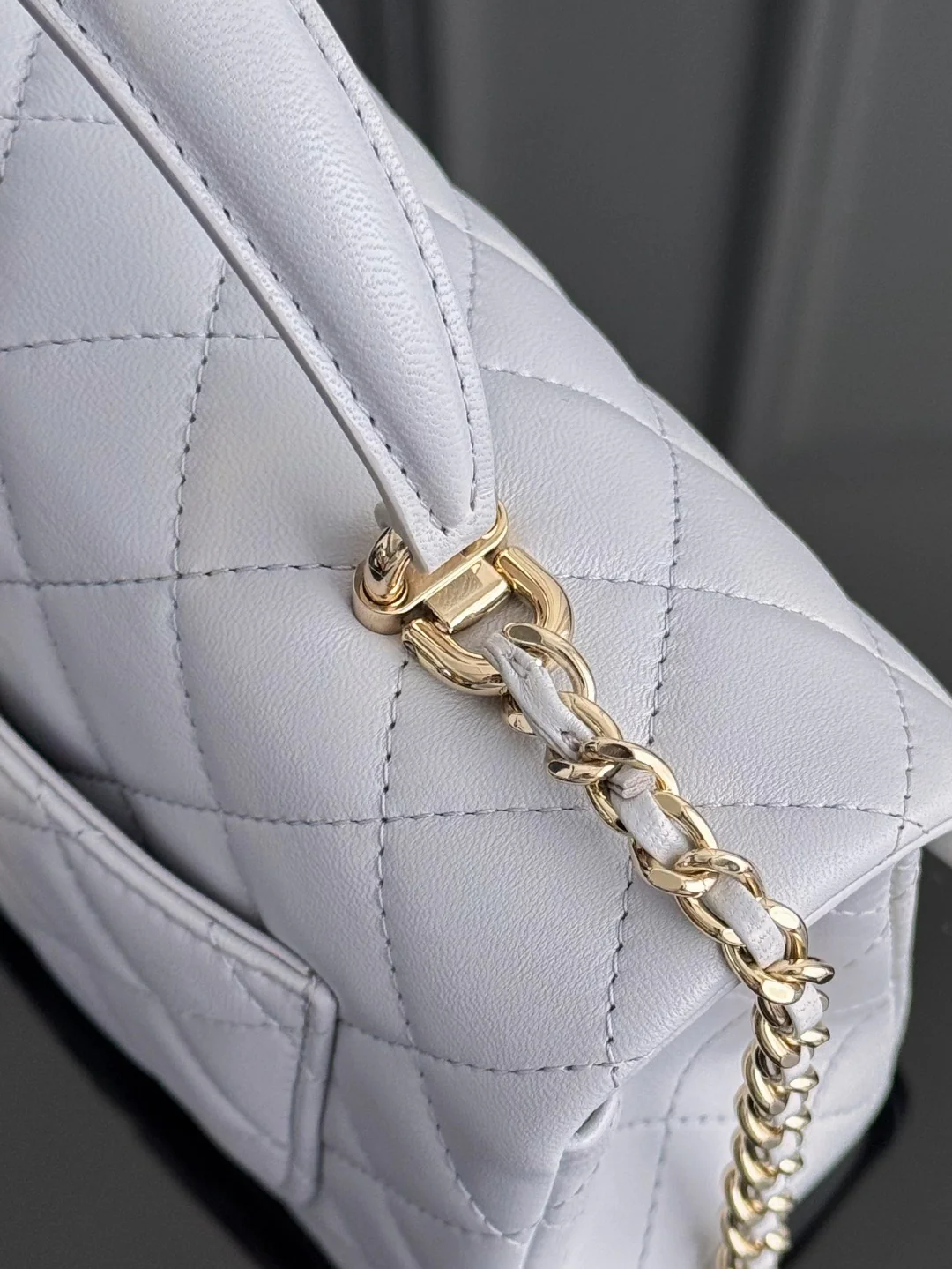 Chan 25P mini flap bag with top handle