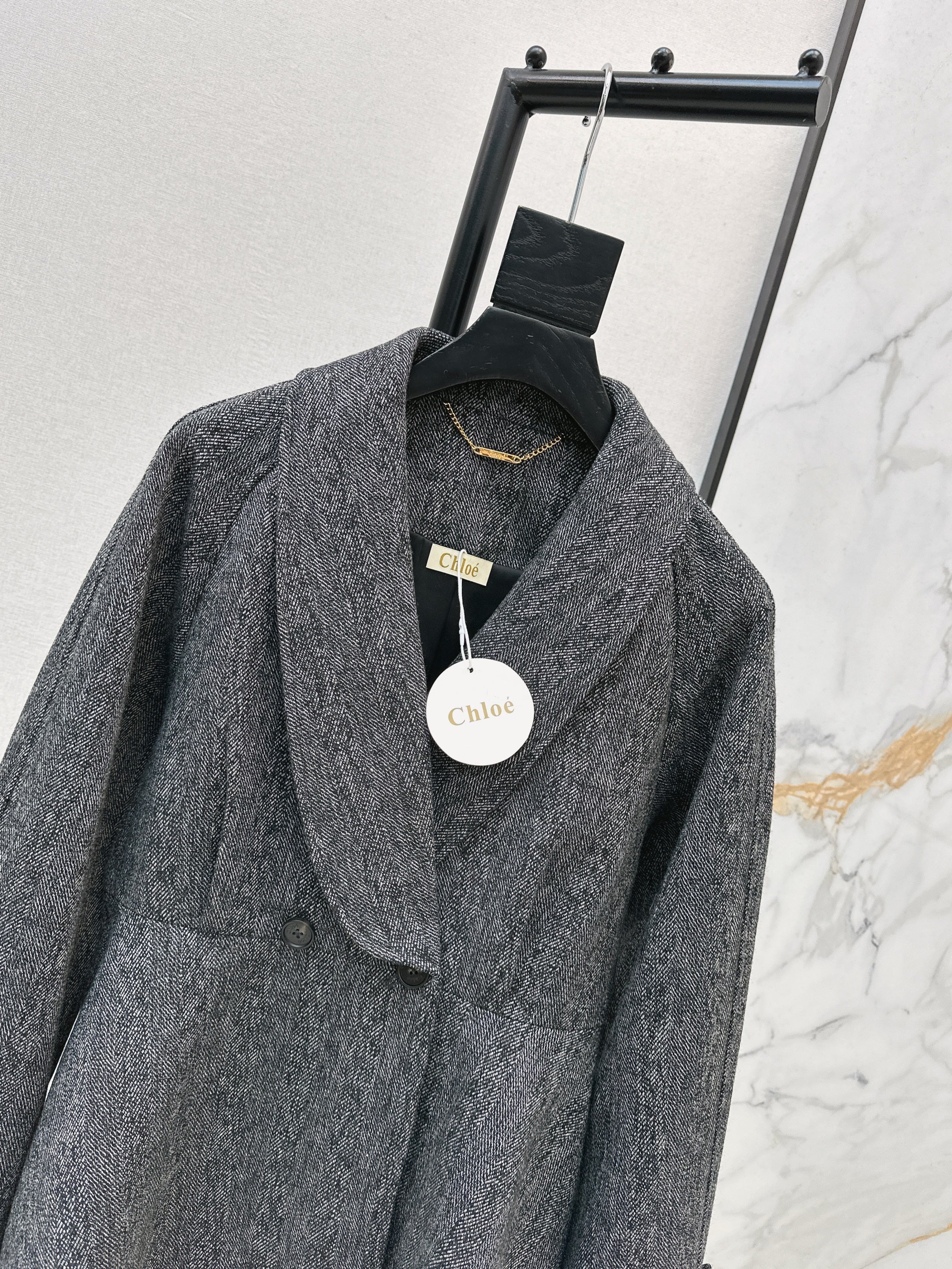 Chol 26ss ruffle-hem belted jacket