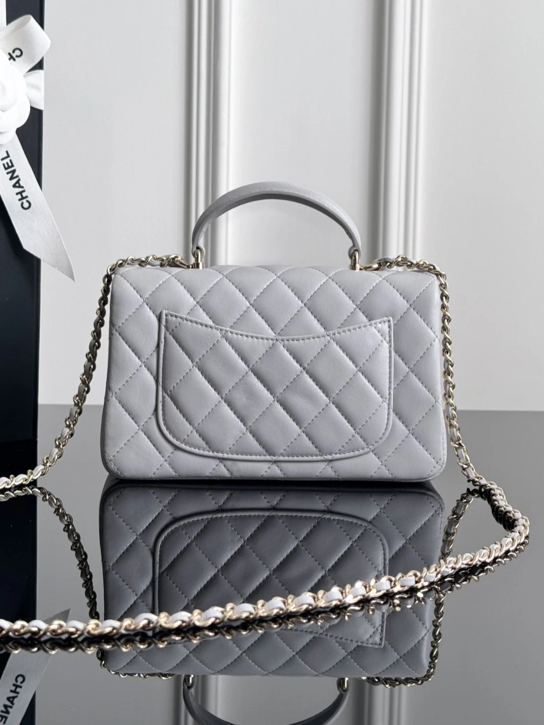 Chan 25P mini flap bag with top handle